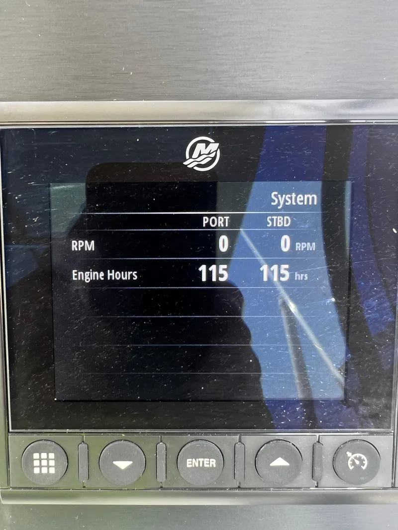 Slide: The Image of Display screen of 2024 Beneteau 29' Flyer 9 SUNdeck showing engine hours and RPM. - 7