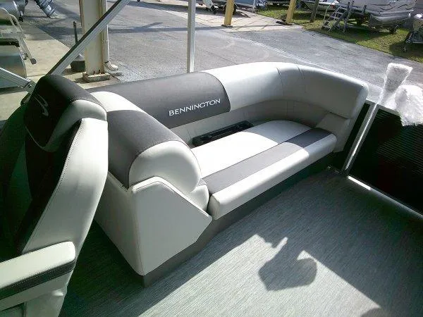 Slide: The Image of 2025 Bennington 22SSR boat interior with sleek, modern seating design. - 5