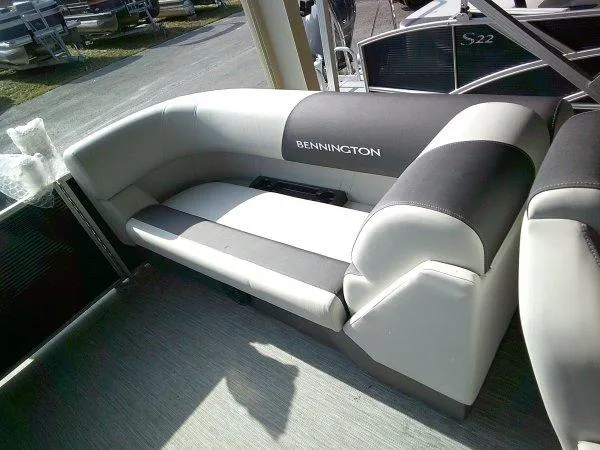 Slide: The Image of 2025 Bennington 22SSR boat interior with gray and black seating. - 7