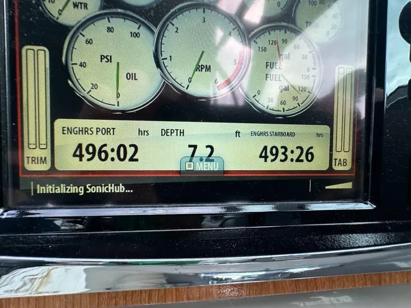 Slide: The Image of Display panel of a 2003 Wellcraft 3700 Martinique showing engine hours and depth. - 4