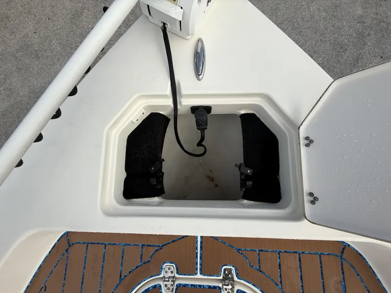 Slide: The Image of Open storage compartment on 2021 Pathfinder 2400 TRS boat deck. - 21
