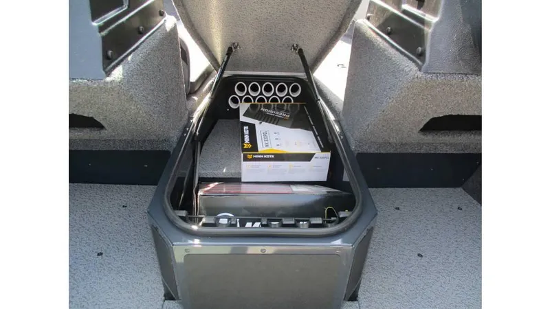 Slide: The Image of 2025 Lund Adventure 1775 Sport boat storage compartment with accessories and equipment. - 13