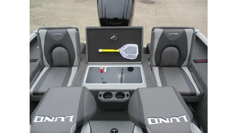 Slide: The Image of 2025 Lund Adventure 1775 Sport boat interior with seating and storage compartments. - 15