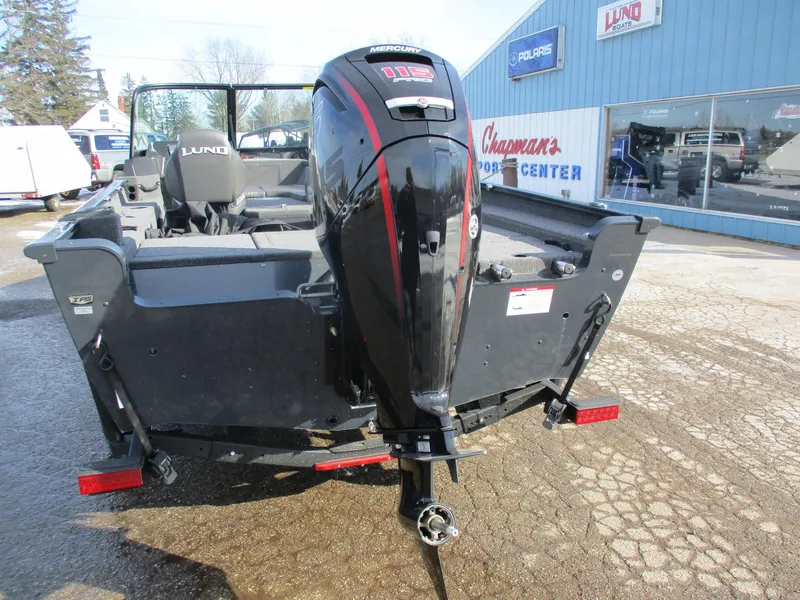 Slide: The Image of 2025 Lund Adventure 1775 Sport boat with Mercury outboard motor at dealership. - 9