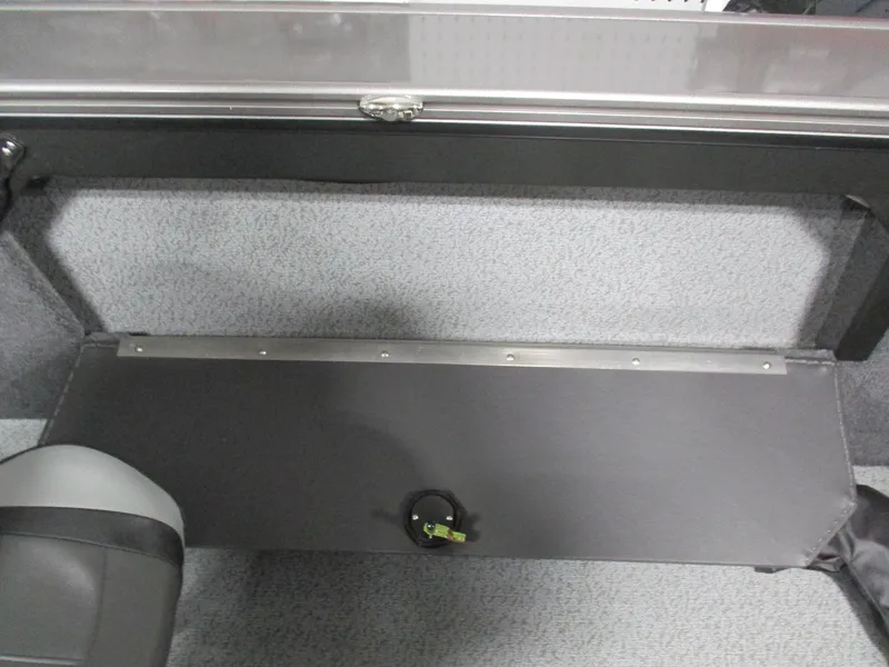 Slide: The Image of 2025 Lund 2075 Fisherman boat interior with storage compartment and seating. - 12