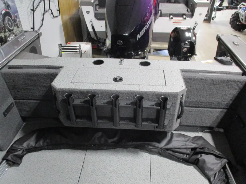 Slide: The Image of 2025 Lund 2075 Fisherman boat interior with rod holders and storage compartment. - 4