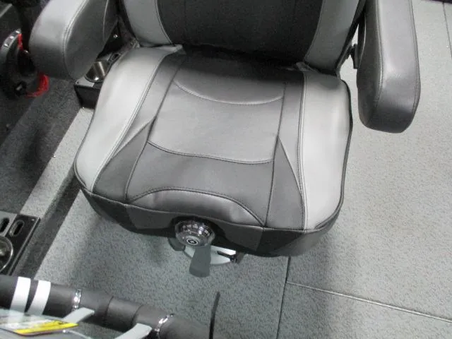 Slide: The Image of Comfortable seating in 2025 Lund 1975 Pro V Sport boat, featuring sleek black and gray design. - 11
