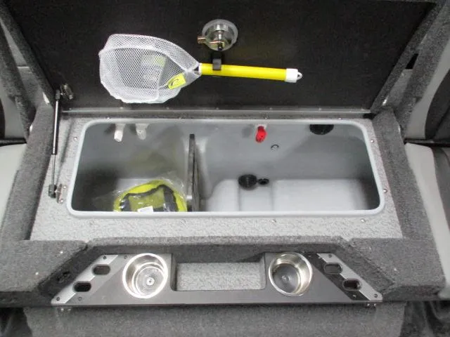 Slide: The Image of Interior of 2025 Lund 1975 Pro V Sport boat with storage compartment and fishing net. - 14