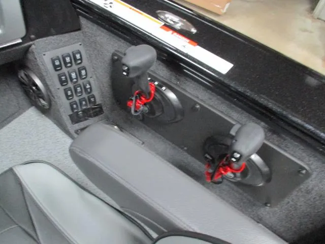 Slide: The Image of 2025 Lund 1975 Pro V Sport boat, rear view with dual outboard motors. - 16