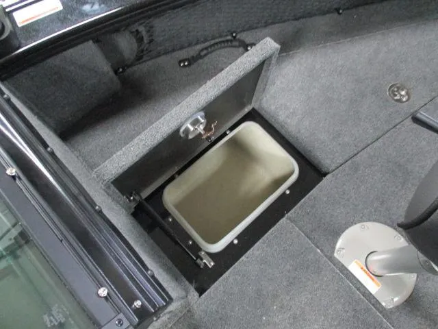 Slide: The Image of Open storage compartment in 2025 Lund 1975 Pro V Sport boat. - 20