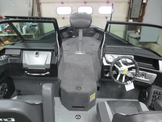 Slide: The Image of Interior of 2025 Lund 1975 Pro V Sport boat with modern dashboard and seating. - 3