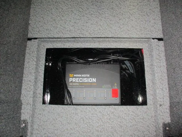 Slide: The Image of Minn Kota Precision charger installed in 2025 Lund 1975 Pro V Sport boat. - 4