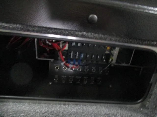 Slide: The Image of Control panel inside a 2025 Lund 1975 Pro V Sport boat. - 8