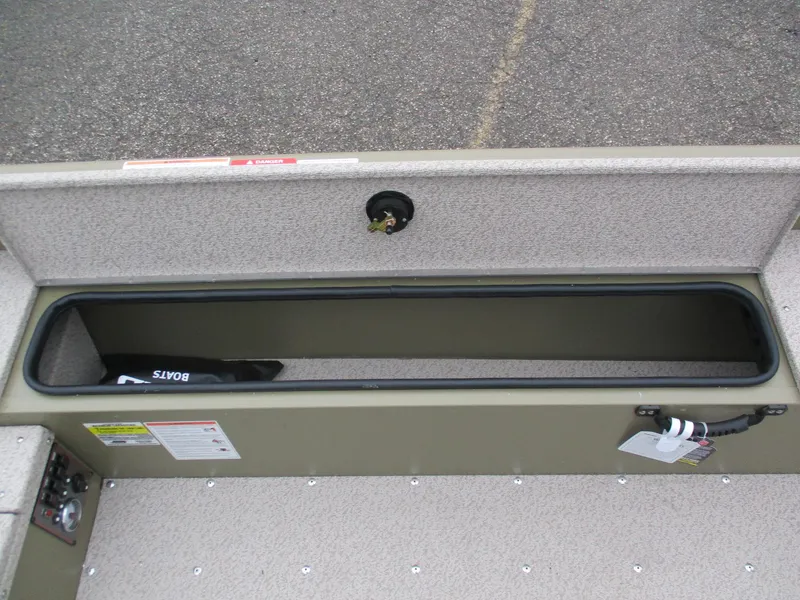 Slide: The Image of 2025 Lund Alaskan 1875 Tiller boat interior storage compartment. - 6