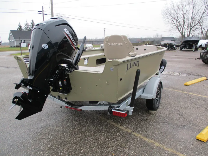 Slide: The Image of 2025 Lund Alaskan 1875 Tiller boat with Mercury outboard motor on trailer. - 9
