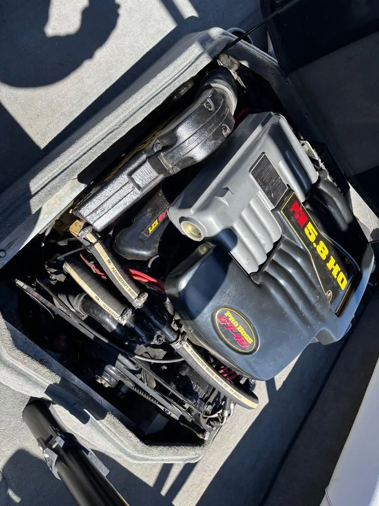 Slide: The Image of 2000 Nautique Air Nautique engine compartment with PCM 5.8 HO motor. - 16