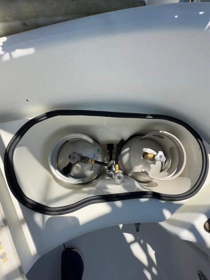 Slide: The Image of Beneteau 411 (2000) sailboat gas compartment with two propane tanks. - 5