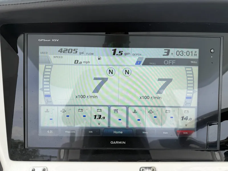 Slide: The Image of Garmin GPS display on 2019 Robalo R302 Center Console boat showing navigation data. - 42
