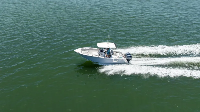 Slide: The Image of 2022 Sea Fox 268 Commander boat cruising on open water. - 12
