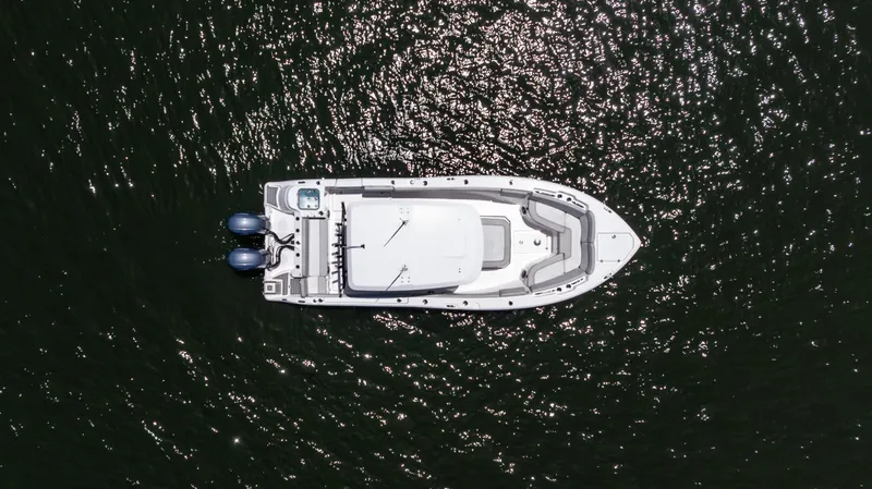 Slide: The Image of Aerial view of 2022 Sea Fox 268 Commander boat on shimmering water. - 16