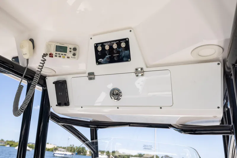 Slide: The Image of 2022 Sea Fox 268 Commander console with radio and control panel. - 43