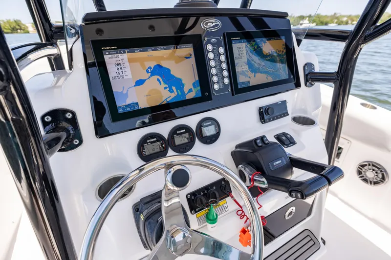 Slide: The Image of 2022 Sea Fox 268 Commander dashboard with navigation screens and controls. - 47
