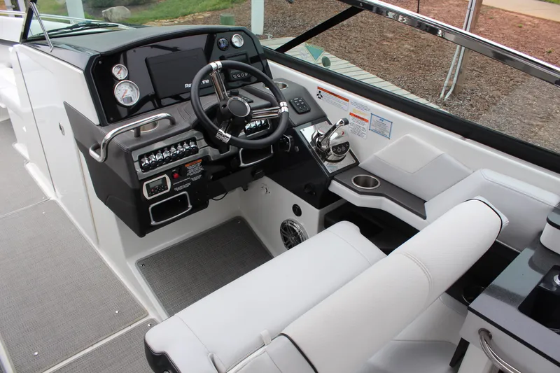 Slide: The Image of 2021 Formula 290 Bowrider cockpit with modern controls and comfortable seating. - 13