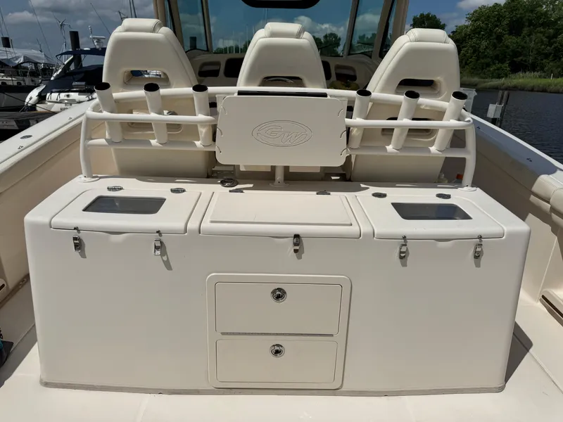 Slide: The Image of 2017 Grady-White Canyon 376 boat interior with seating and storage compartments. - 10