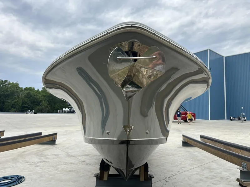 Slide: The Image of 2020 Sea Hunt Gamefish 30 with Coffin Box, front view, in a boatyard setting. - 10