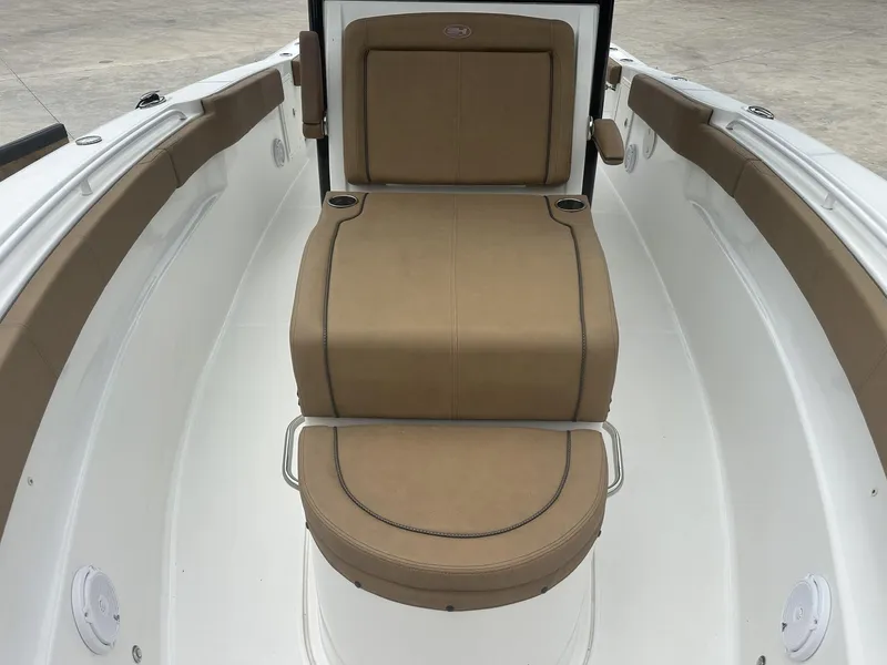 Slide: The Image of 2020 Sea Hunt Gamefish 30 interior with tan coffin box seating. - 27