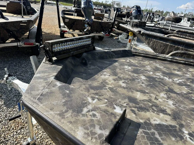 Slide: The Image of 2025 Excel Viper F4 1751 boat with camouflage pattern and LED light bar on trailer. - 6