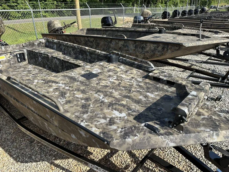 Slide: The Image of 2025 Excel Viper F4 1751 boat with camouflage design on a trailer. - 2