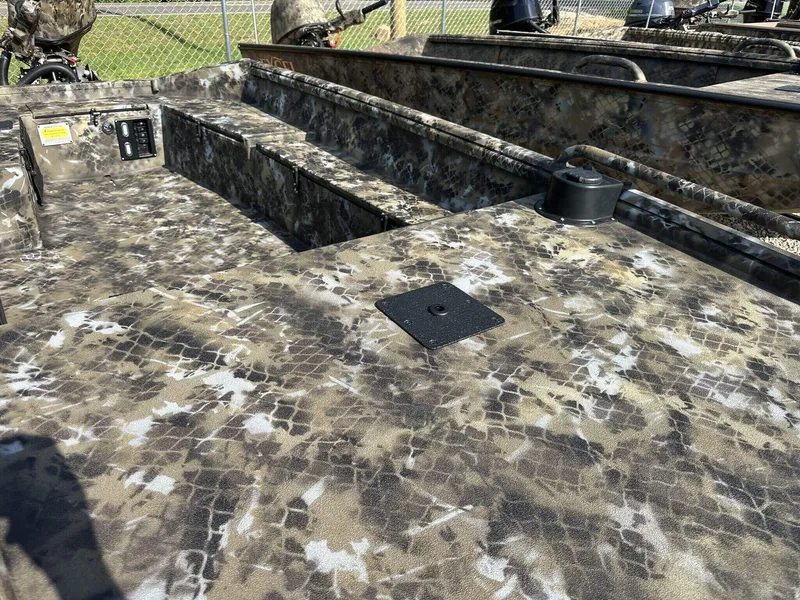 Slide: The Image of Camouflage-patterned deck of 2025 Excel Viper F4 1751 boat, featuring rugged design. - 4