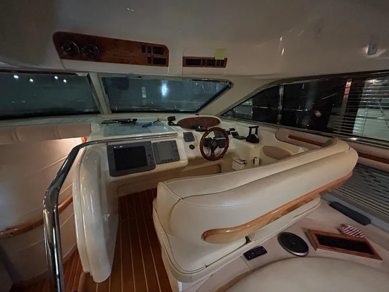 Slide: The Image of Interior of 2000 Sealine F44 yacht with modern helm and navigation equipment. - 17