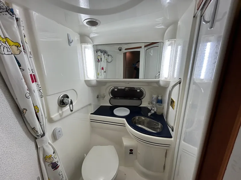 Slide: The Image of Bathroom interior of 2000 Sealine F44 yacht, featuring modern fixtures and compact design. - 30
