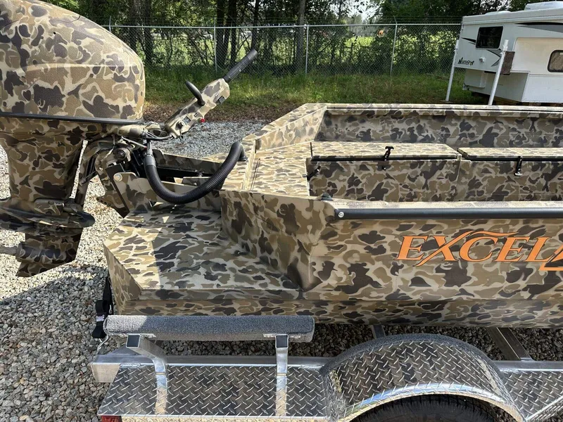 Slide: The Image of Camouflage-patterned Excel Viper F4 1751 boat, 2025 model, on a trailer. - 2