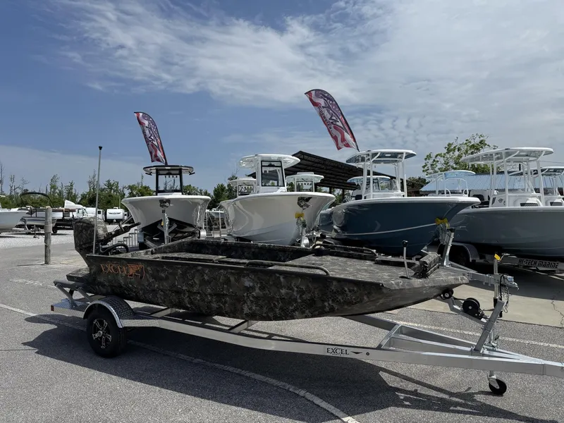 Slide: The Image of 2025 Excel Viper F4 1751-YAMHA 60 boat on trailer, displayed outdoors. - 1