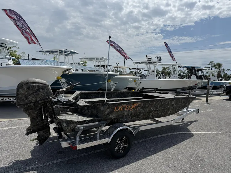 Slide: The Image of 2025 Excel Viper F4 1751-YAMHA 60 boat on trailer, displayed outdoors. - 2