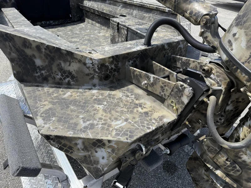 Slide: The Image of Camouflage-patterned Excel Viper F4 1751-YAMHA 60 boat, 2025 model, on a trailer. - 4