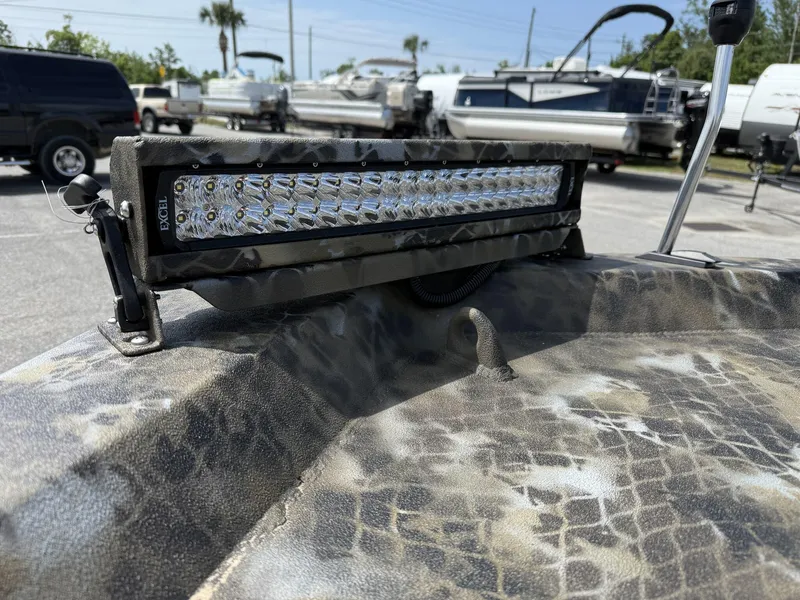 Slide: The Image of LED light bar on Excel Viper F4 1751-YAMHA 60 boat, 2025 model, in a parking lot. - 8