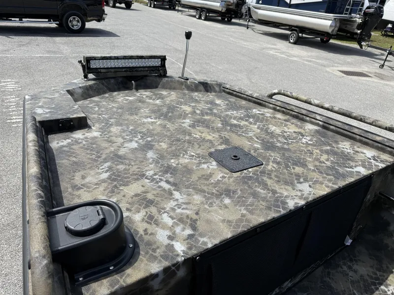 Slide: The Image of Camouflage-patterned deck of 2025 Excel Viper F4 1751-YAMHA 60 boat in parking lot. - 9