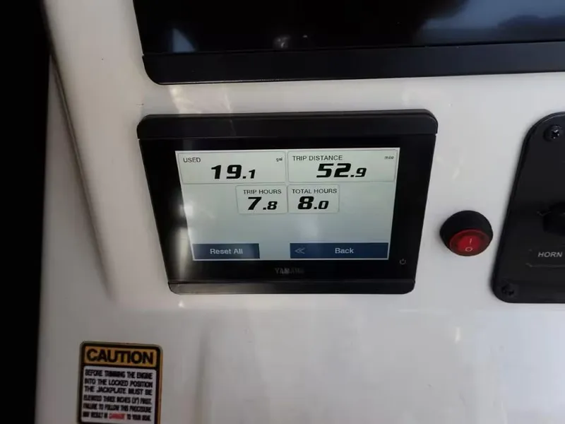 Slide: The Image of Dashboard display of a 2024 Pathfinder 2600 TRS showing trip data and fuel usage. - 10