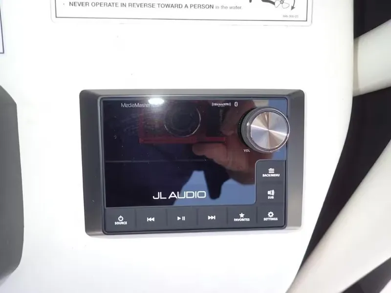 Slide: The Image of JL Audio MediaMaster control panel on 2024 Pathfinder 2600 TRS boat. - 8