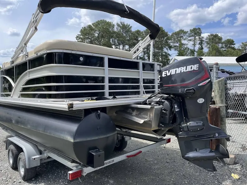 Slide: The Image of 2018 Sylvan Mirage 8522 Cruise Port pontoon boat with Evinrude outboard motor on trailer. - 3