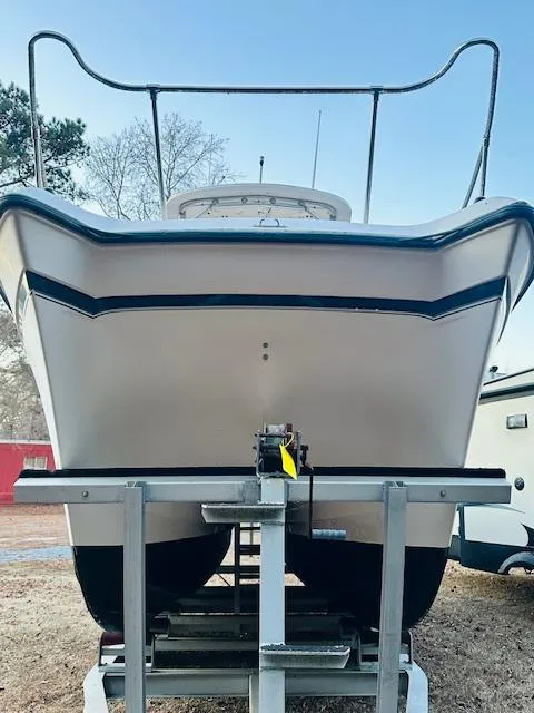 Slide: The Image of 1997 Grady-White F-26 Tigercat boat on trailer, front view. - 11