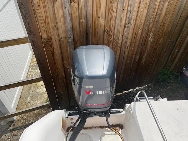 Slide: The Image of 1997 Grady-White F-26 Tigercat with Yamaha V6 150 outboard motor. - 14