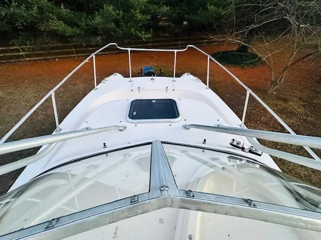 Slide: The Image of 1997 Grady-White F-26 Tigercat boat deck with railing, viewed from above. - 3