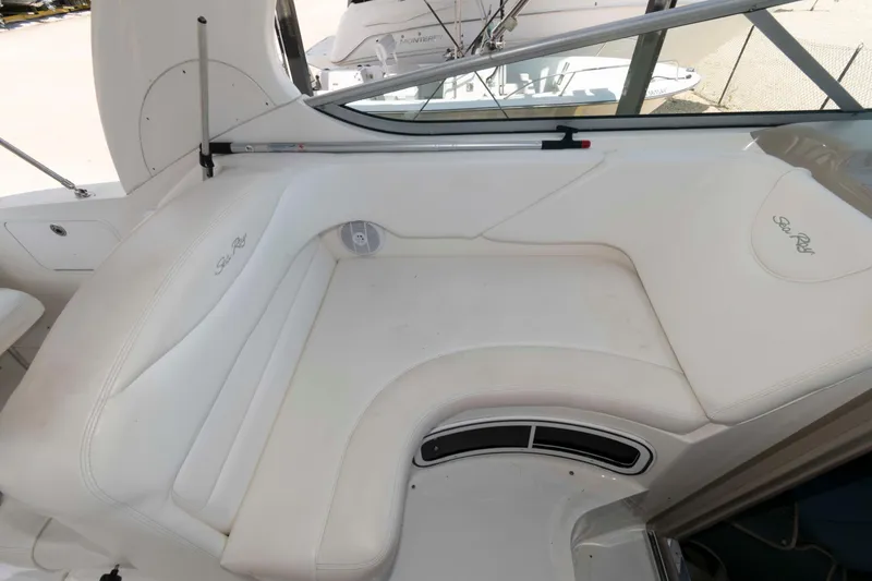 Slide: The Image of Luxurious white seating on a 2007 Sea Ray 280 Sundancer boat. - 4