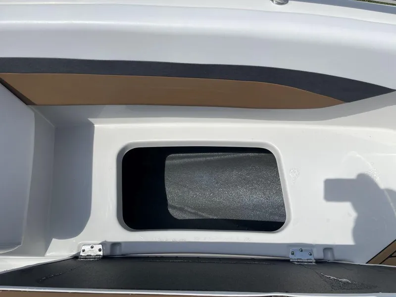 Slide: The Image of Storage compartment of a 2025 Starcraft SVX-171 boat, featuring sleek design and durable materials. - 14