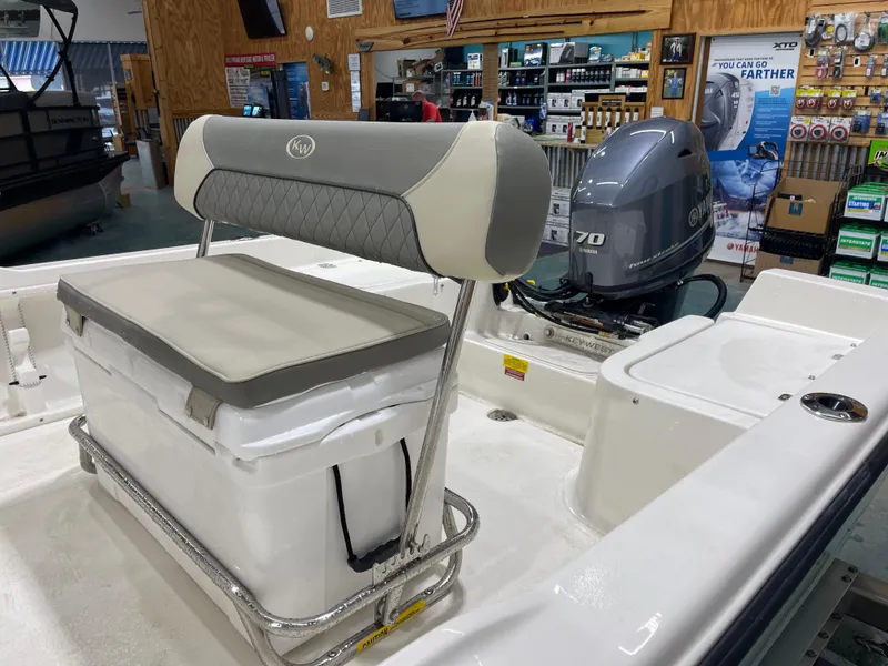 Slide: The Image of 2025 Key West 1720CC boat interior with Yamaha 70 engine in showroom. - 10